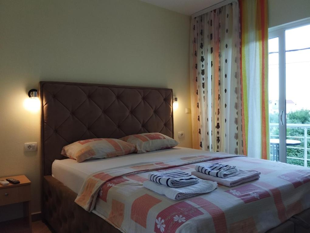 Postel nebo postele na pokoji v ubytování Studio Apartments Tea