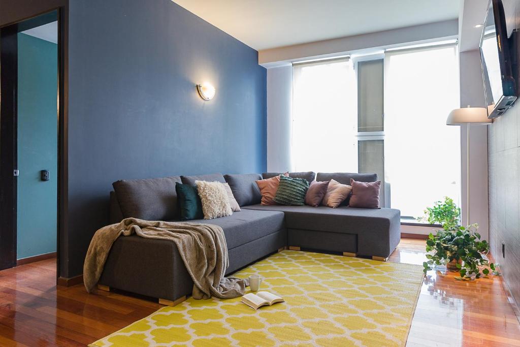 Posezení v ubytování Centro históric 2-BR, apartamento totalmente equipado y moderno