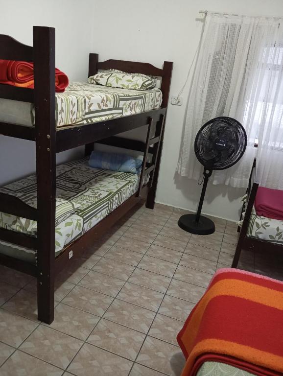 Postel nebo postele na pokoji v ubytování Hostel Brasil Gru