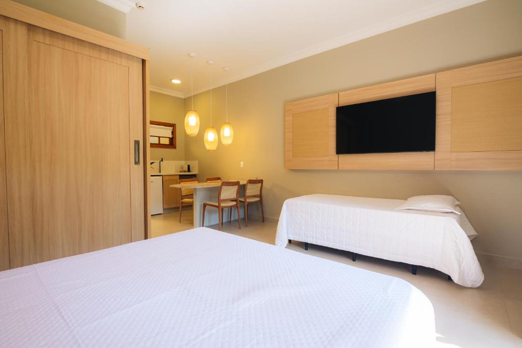 Postel nebo postele na pokoji v ubytování FLAT 3-107 - Iha Flat Hotel - Pereque - Ilhabela