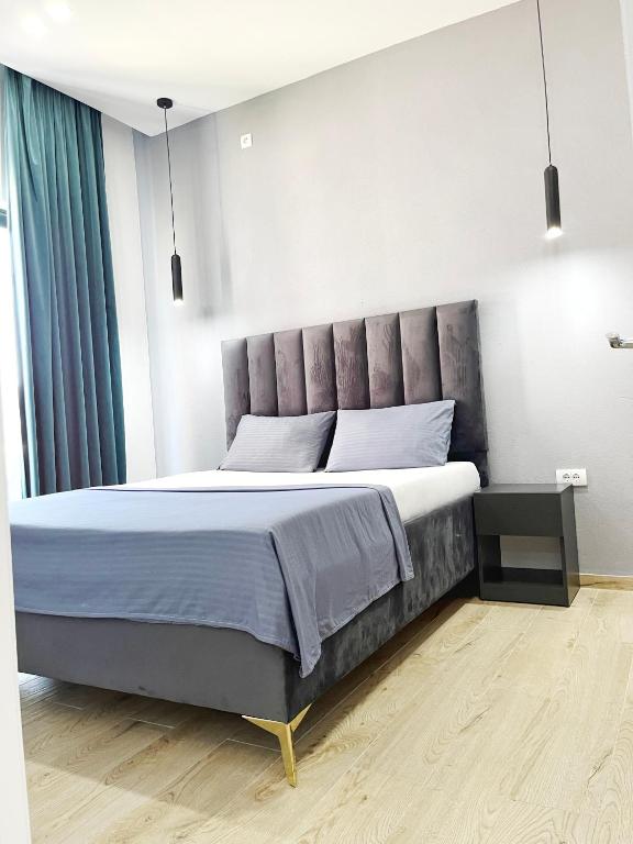 Postel nebo postele na pokoji v ubytování SUPREME Luxury