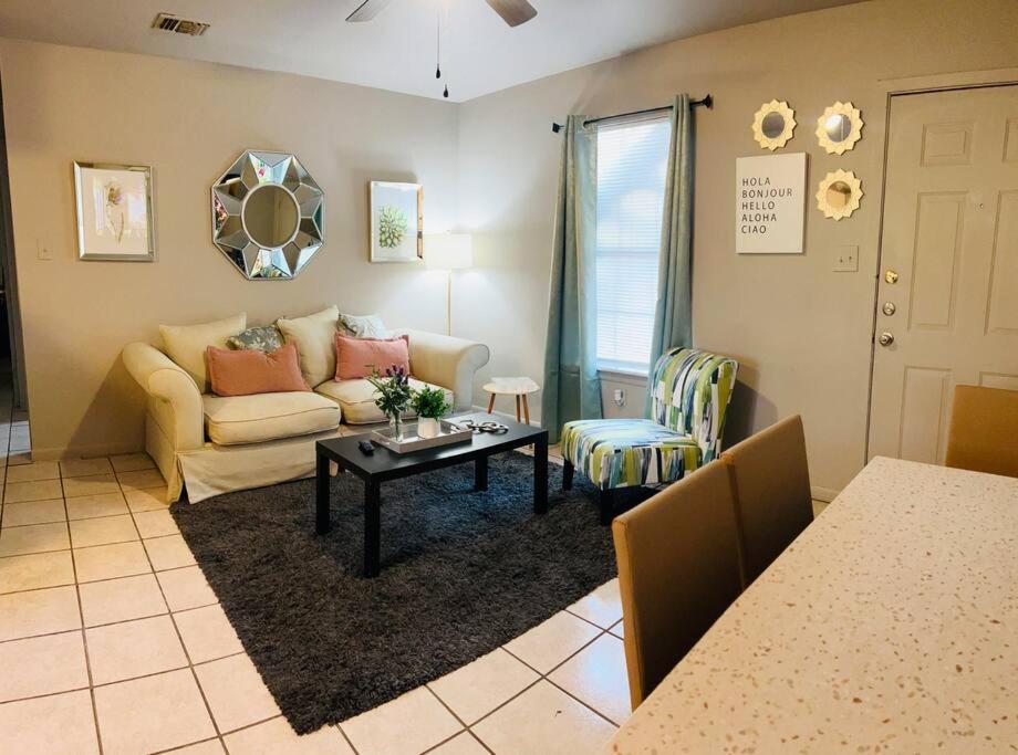 a living room with a couch and a table at Retro Place - 2 bedroom & 1 bathroom - GREAT VALUE in Eagle Pass