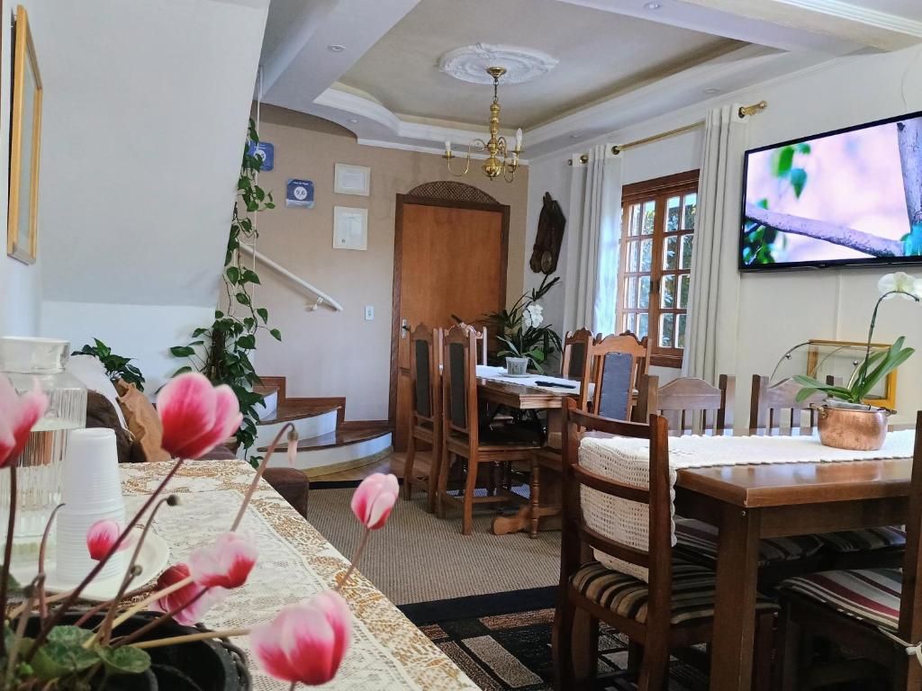 TV a/nebo společenská místnost v ubytování Casa do Papai