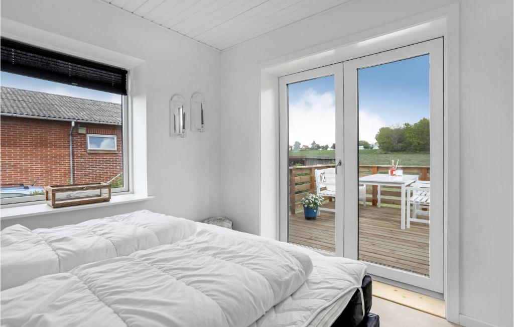 Postel nebo postele na pokoji v ubytování 1 Bedroom Nice Home In Rønne