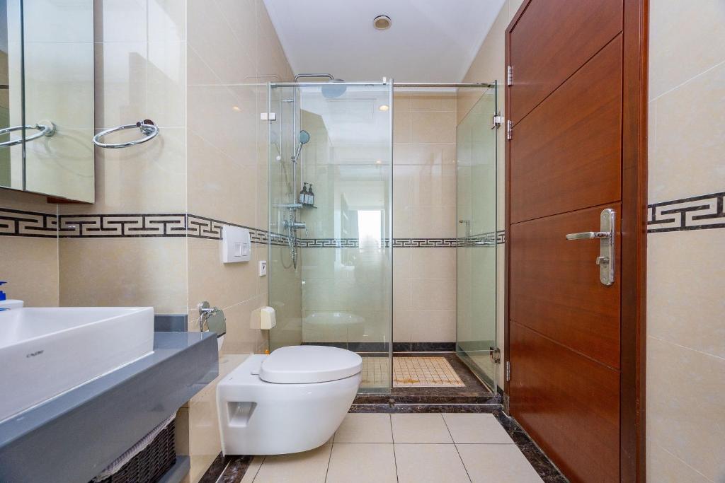 Koupelna v ubytování Qingdao Elegant Central Apartment