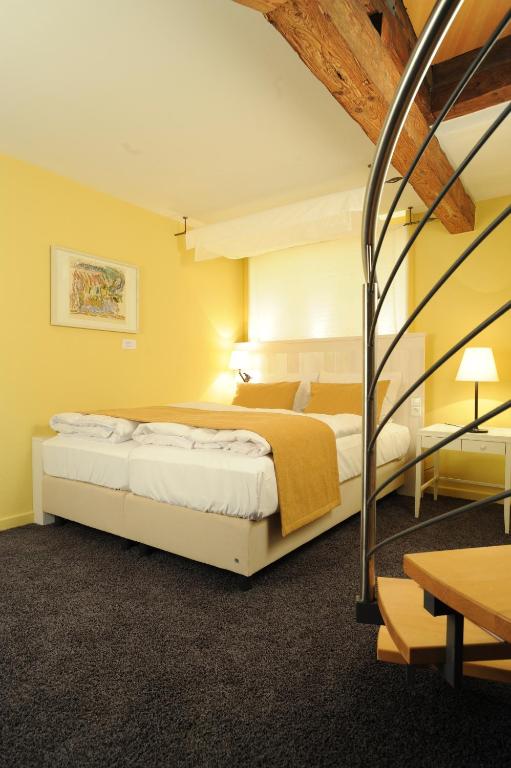Postel nebo postele na pokoji v ubytování Altes Amtshaus, 3-Sterne Hotel Garni Superior