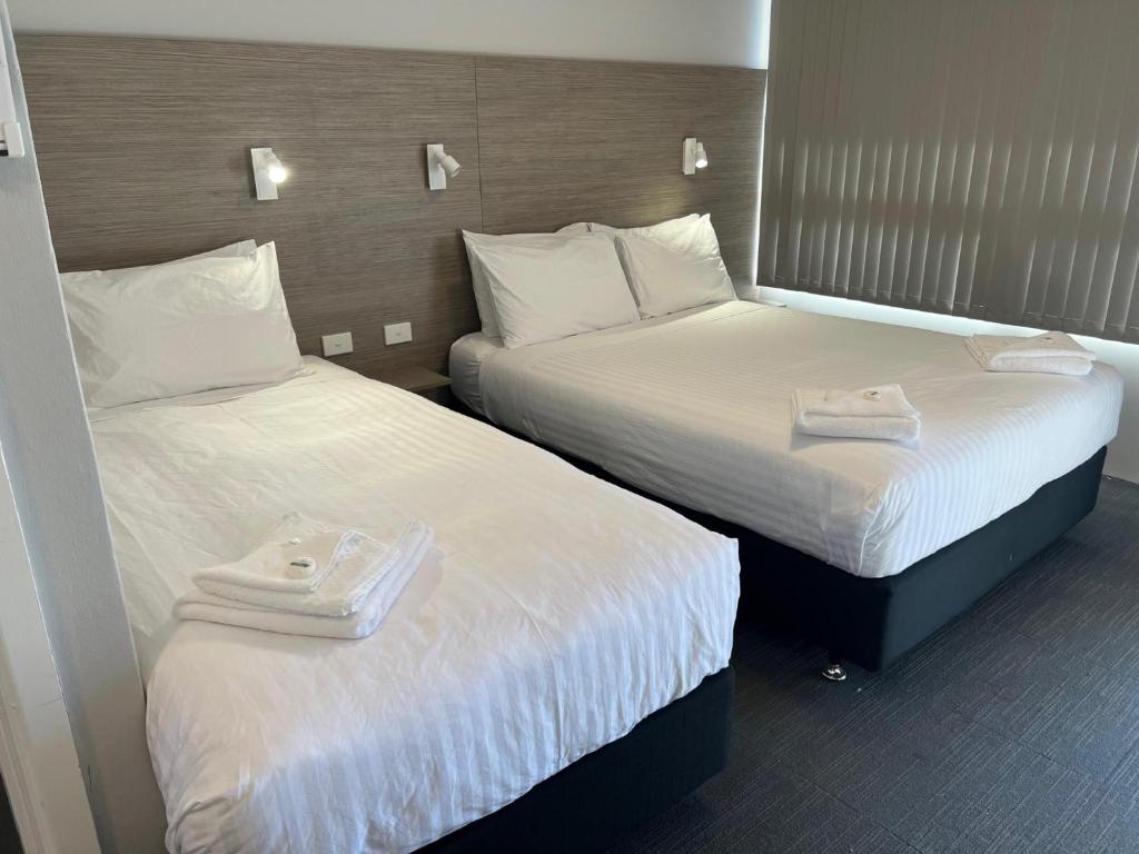Postel nebo postele na pokoji v ubytování Elimatta Hotel
