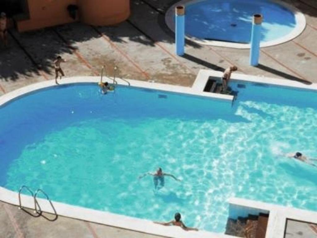 Photo de la galerie de l'établissement Gruissan - Appartement T3 ensoleillé - 6 pers - Piscine collective et parking - FR-1-796-44, à Gruissan