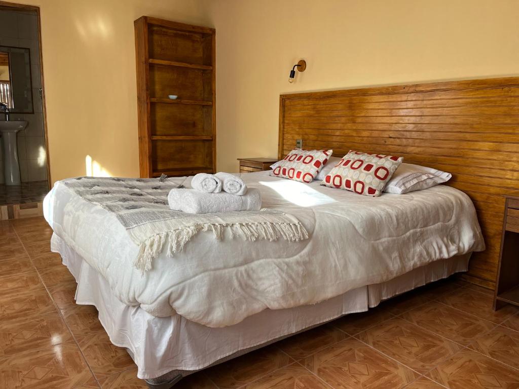Voodi või voodid majutusasutuse Hostal Piedrita de Rio toas