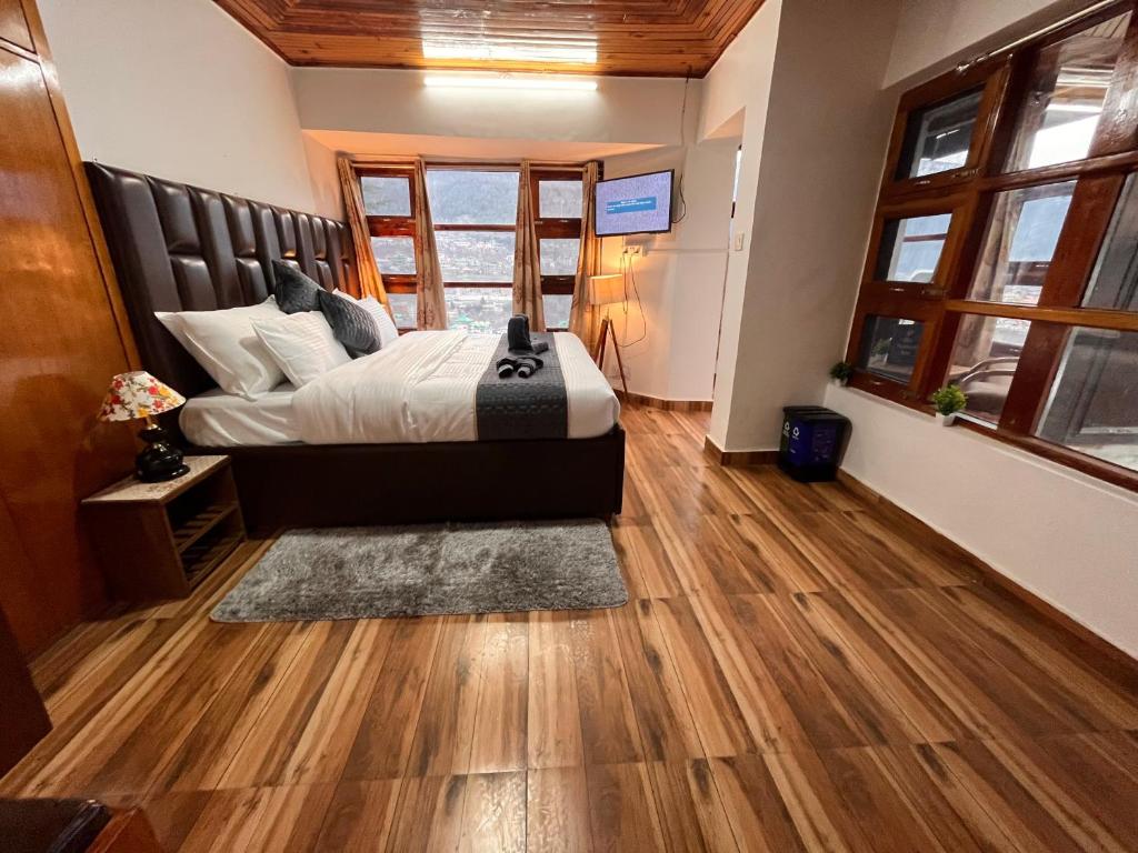 Posezení v ubytování Himalayan River Mountain View 2 Bedrooms Cottage, Manali