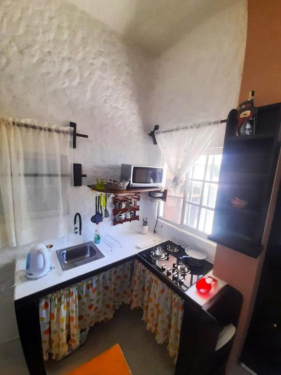 Kuchyň nebo kuchyňský kout v ubytování Hostal Cann's House