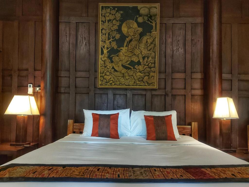Postel nebo postele na pokoji v ubytování Mekong Villas