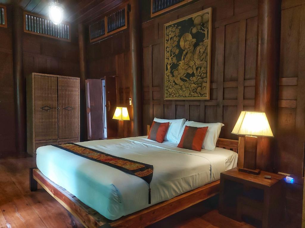 Postel nebo postele na pokoji v ubytování Mekong Villas