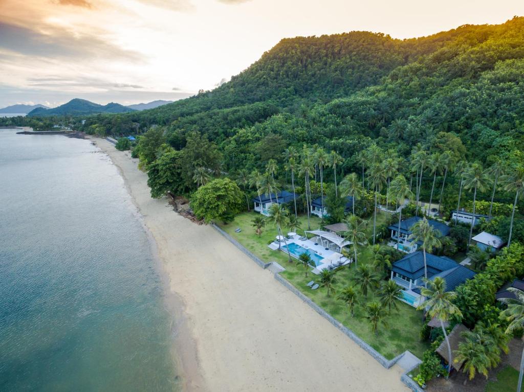an aerial view of a resort on the beach at Coastal Escape Koh Yao Noi in Ko Yao Noi
