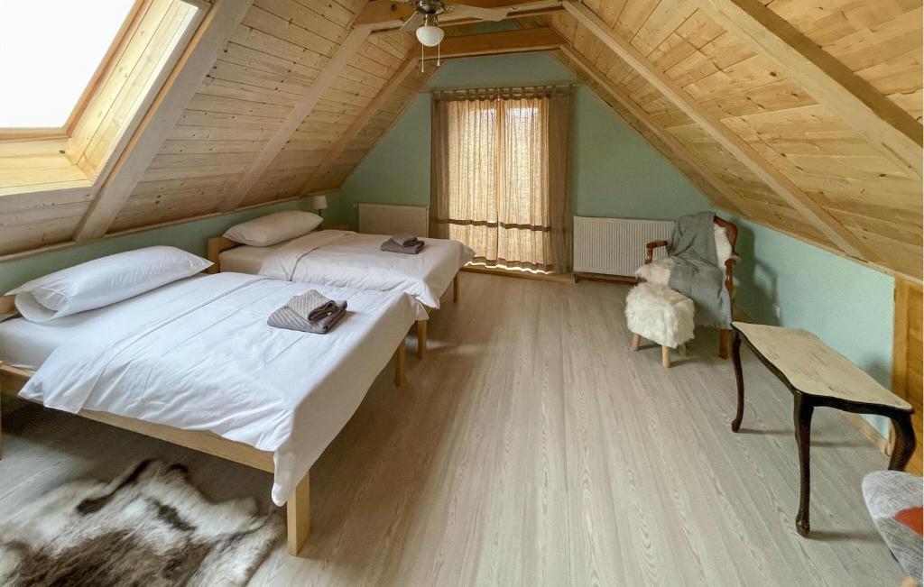 Postel nebo postele na pokoji v ubytování Cozy Home In Mrkopalj With Jacuzzi
