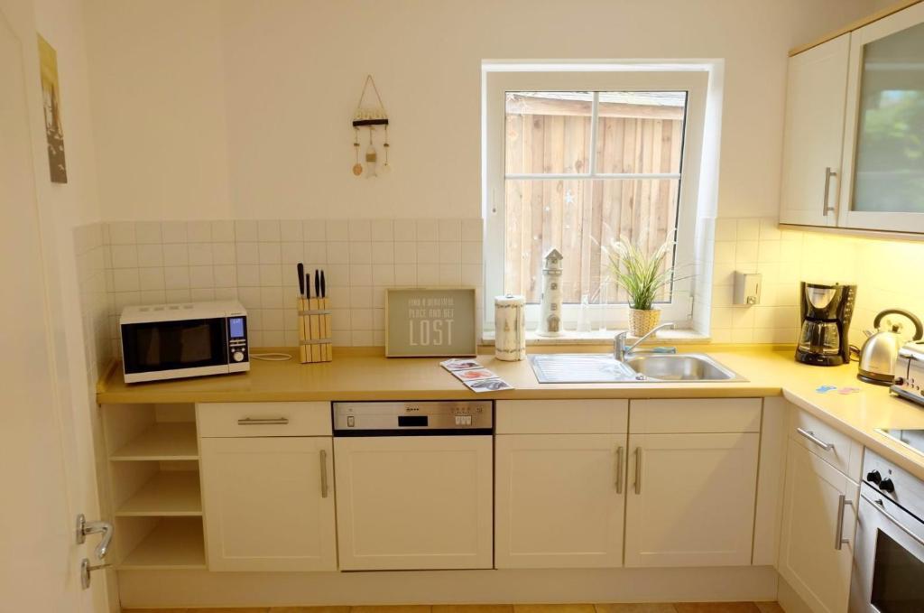 Kuchyň nebo kuchyňský kout v ubytování Ferienhaus Robert