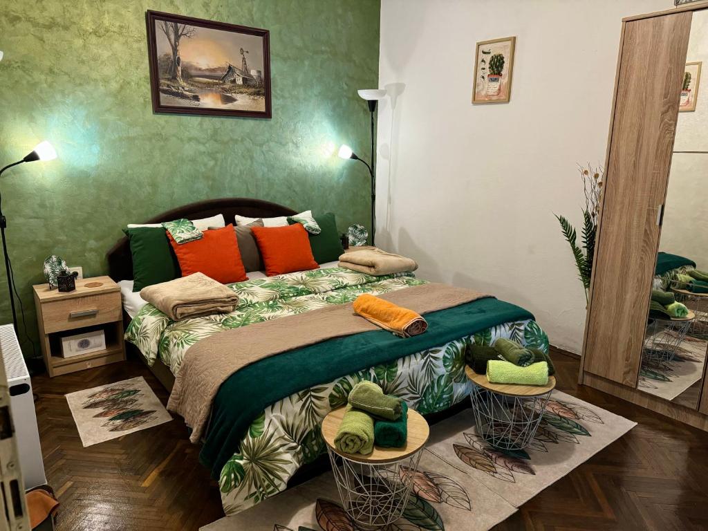 Postel nebo postele na pokoji v ubytování ApartHotel Maxim