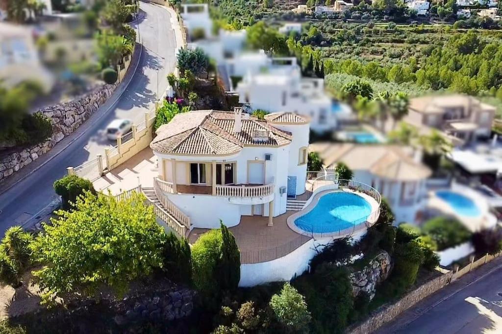 an aerial view of a house with a swimming pool at Casa Luna - Three Bedroom Villa with Stunning View in Benidoleig