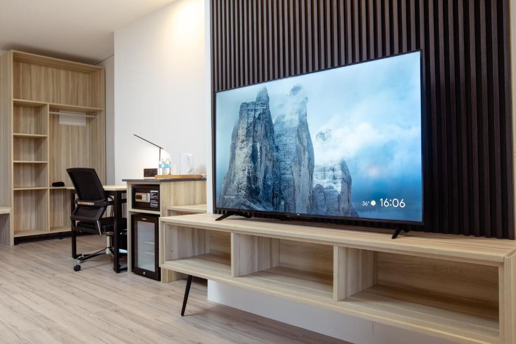 TV a/nebo společenská místnost v ubytování Hamersons Hotel CDO