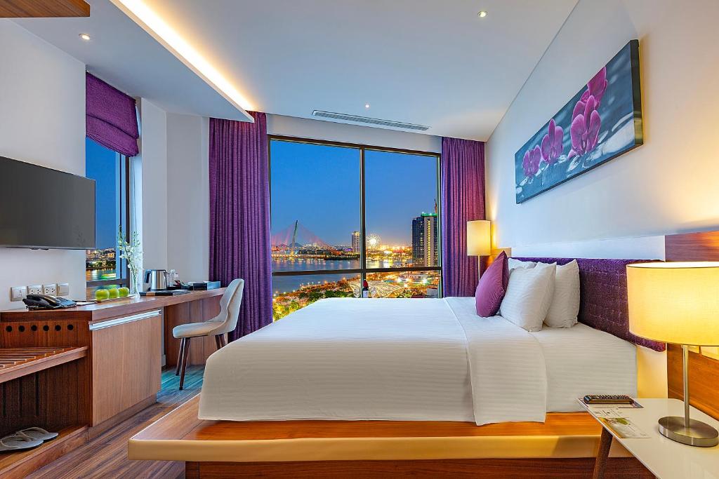 Giường trong phòng chung tại Vanda Hotel