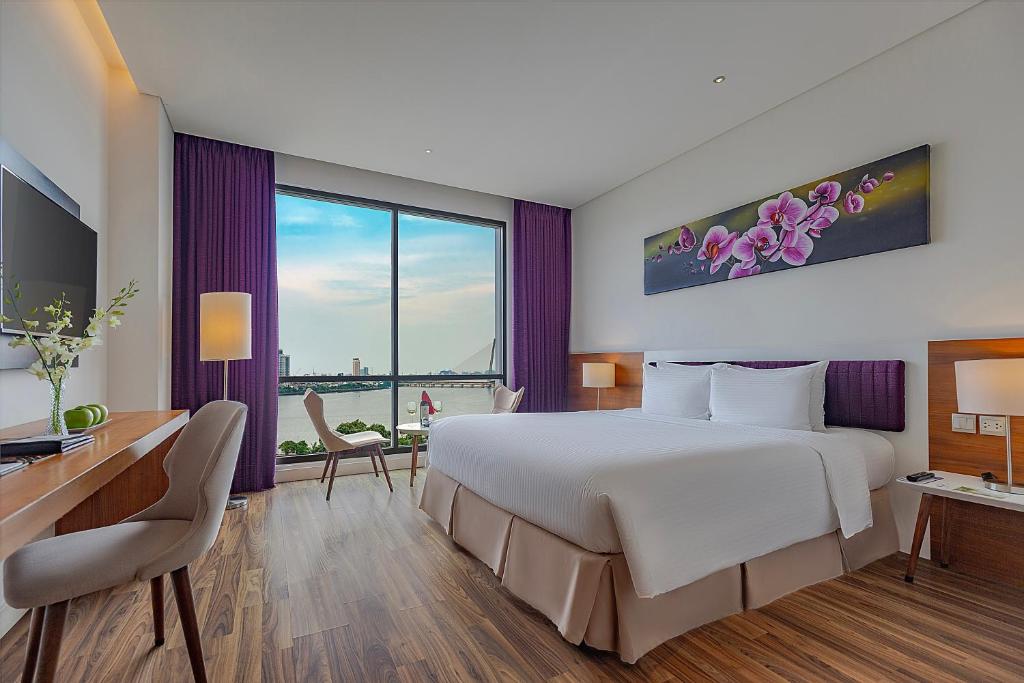 Giường trong phòng chung tại Vanda Hotel