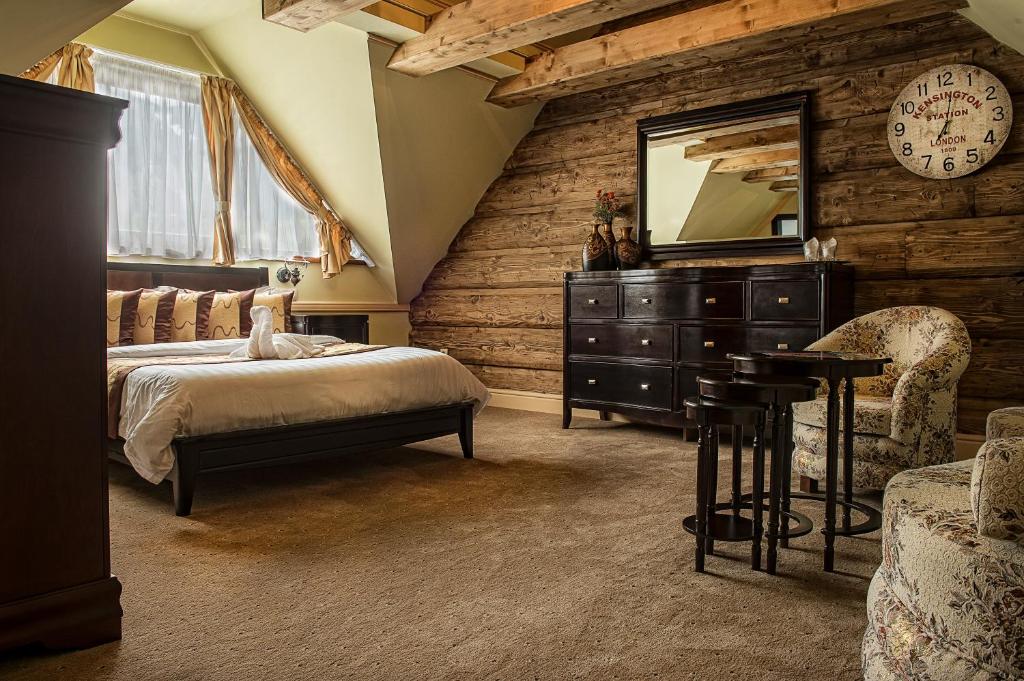 A bed or beds in a room at Mountain Resort Ždiar - River