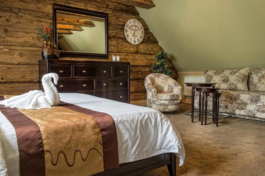 A bed or beds in a room at Mountain Resort Ždiar - River