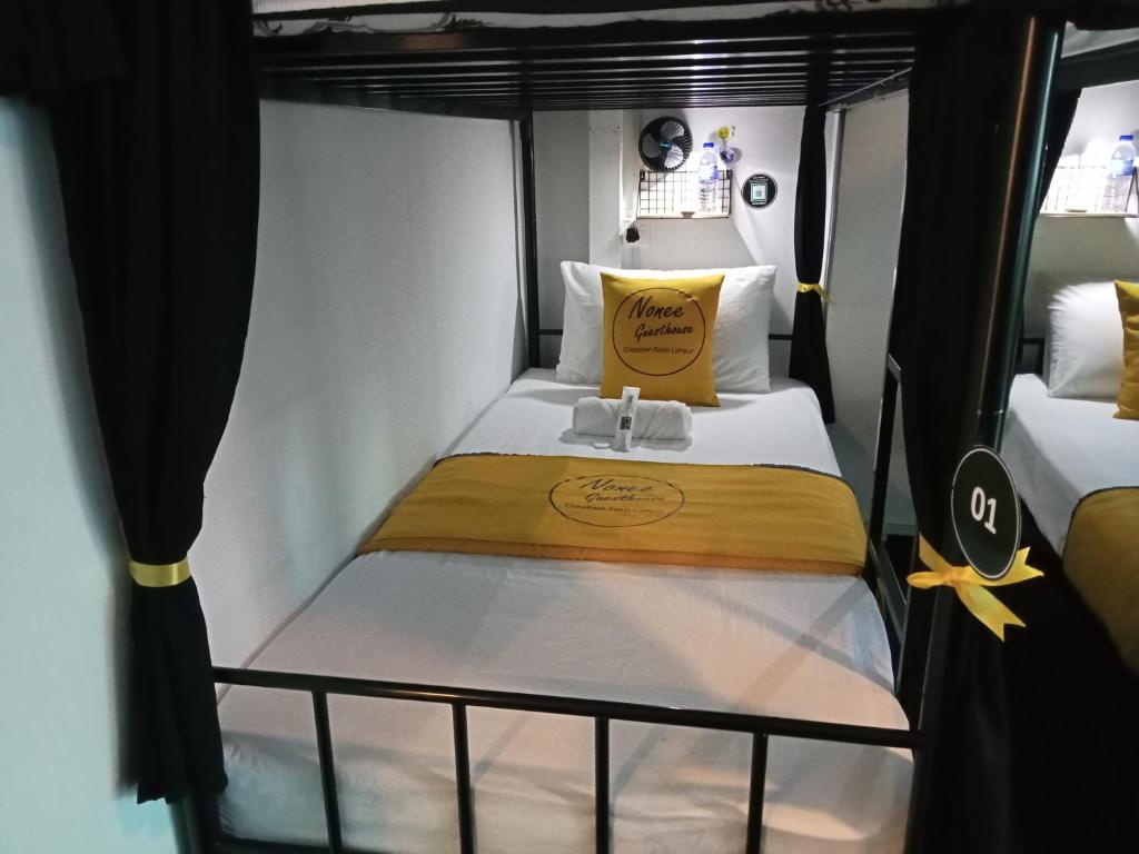 Voodi või voodid majutusasutuse Nonee Guesthouse toas