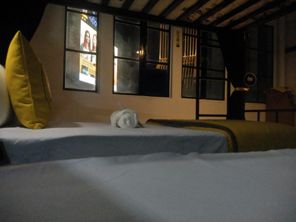 Voodi või voodid majutusasutuse Nonee Guesthouse toas