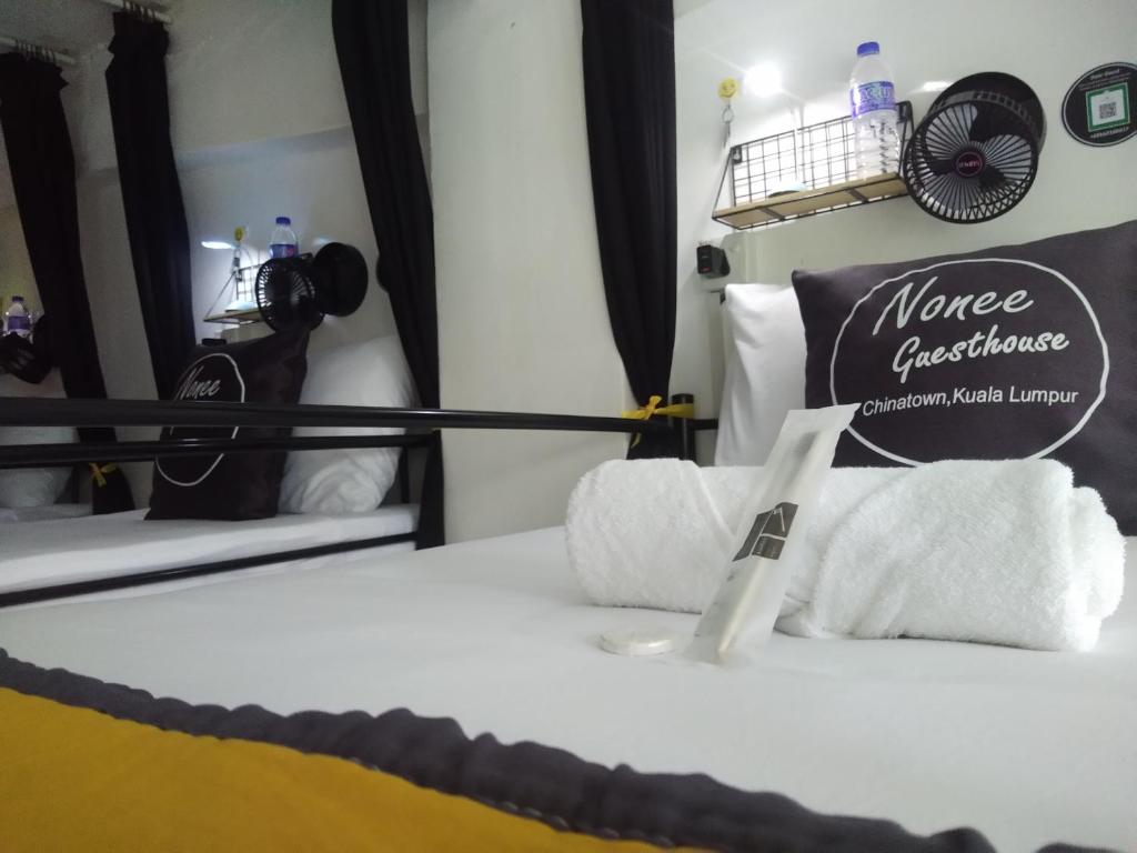Voodi või voodid majutusasutuse Nonee Guesthouse toas
