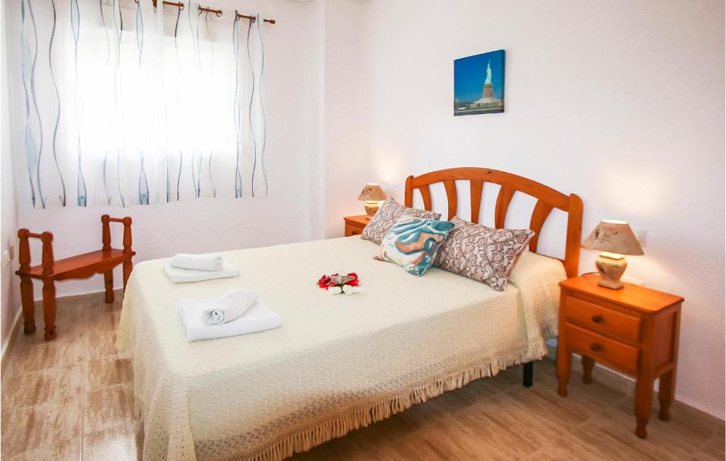 Postel nebo postele na pokoji v ubytování Nice Apartment In Los Arenales Del Sol