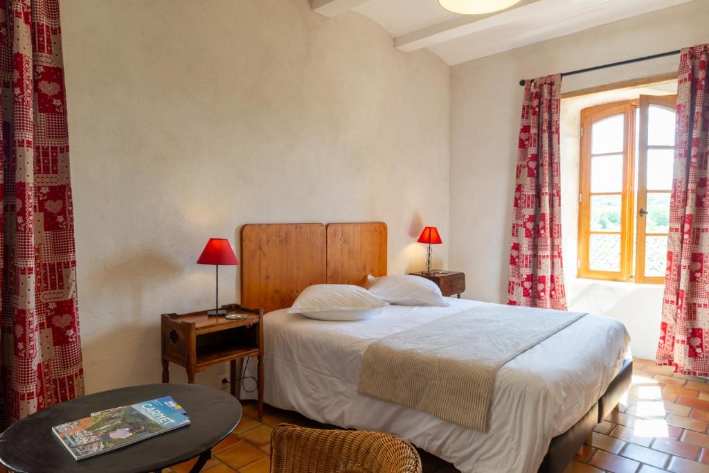 Postel nebo postele na pokoji v ubytování Maison d'Hôtes Mas de la Chadenede