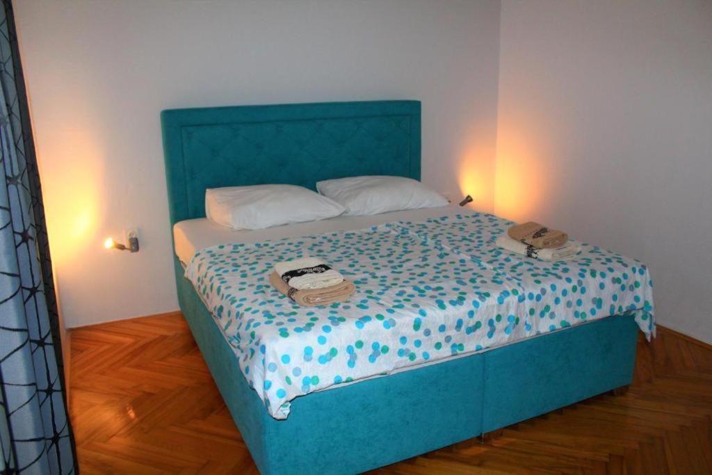 Postel nebo postele na pokoji v ubytování Apartment Nana