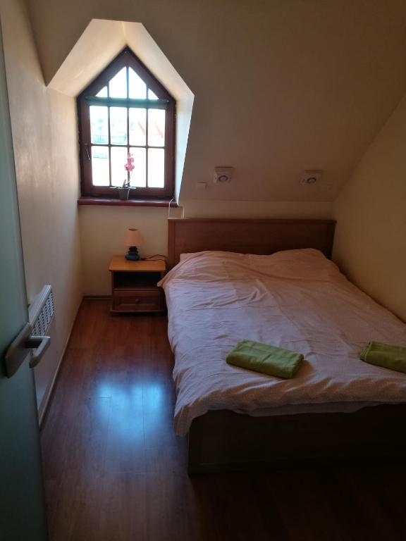 Posteľ alebo postele v izbe v ubytovaní Mikołajki Apartamenty