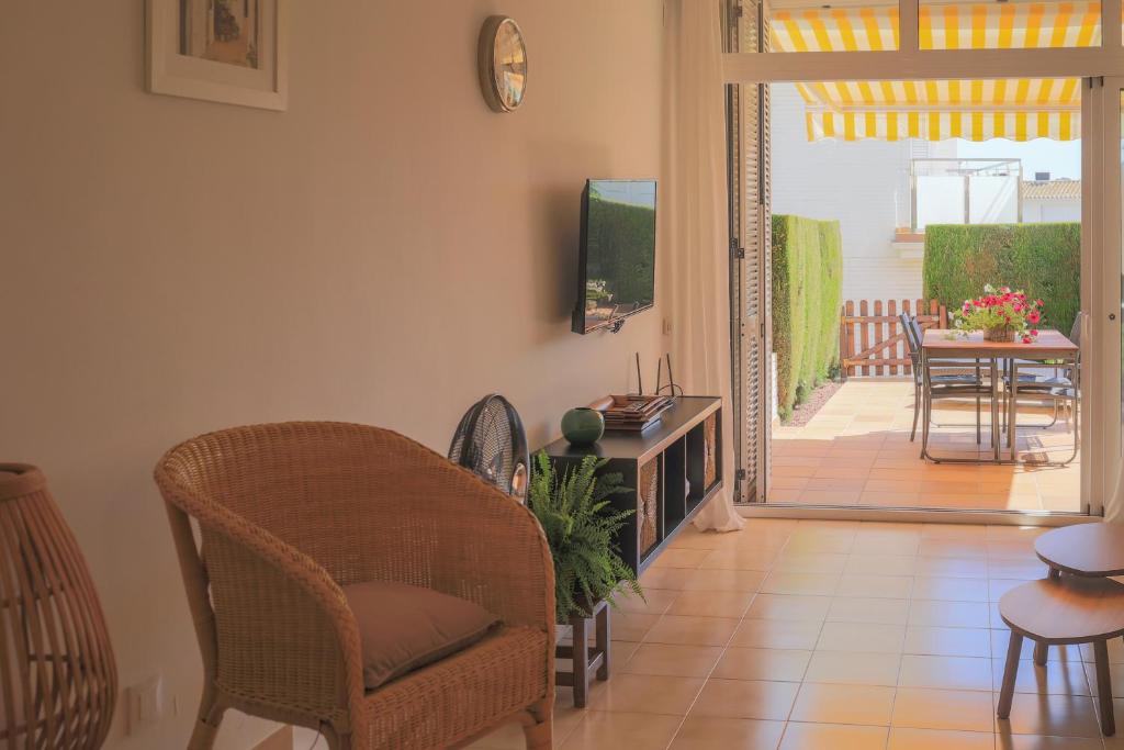 Televízia a/alebo spoločenská miestnosť v ubytovaní Casa 8 Parc Sant Ramon descanso y armonía