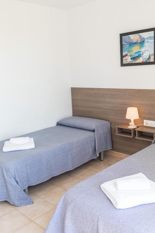 Posteľ alebo postele v izbe v ubytovaní Casa 8 Parc Sant Ramon descanso y armonía