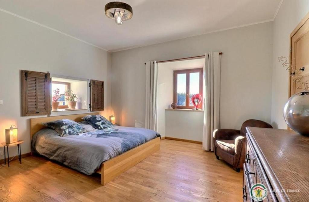 Postel nebo postele na pokoji v ubytování Grange De Sagne maison et table d hôtes avec dîner sur réservation
