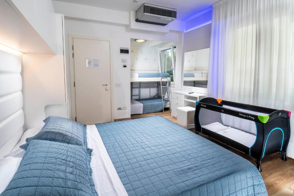 Postel nebo postele na pokoji v ubytování Hotel Albatros