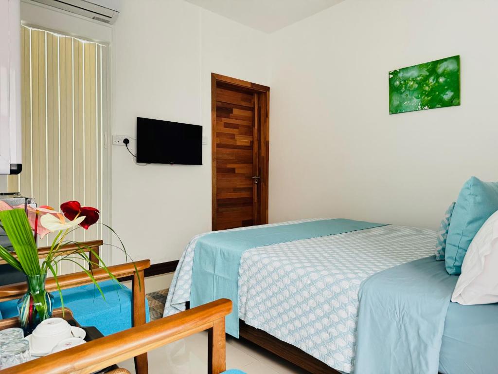 Postel nebo postele na pokoji v ubytování Residence Le Point Choisy