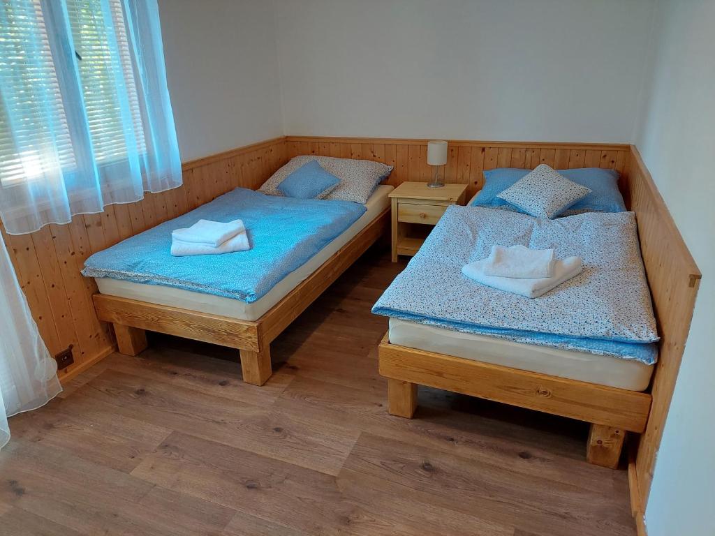 Postel nebo postele na pokoji v ubytování ZÁTOKA Živohošť - Apartmány
