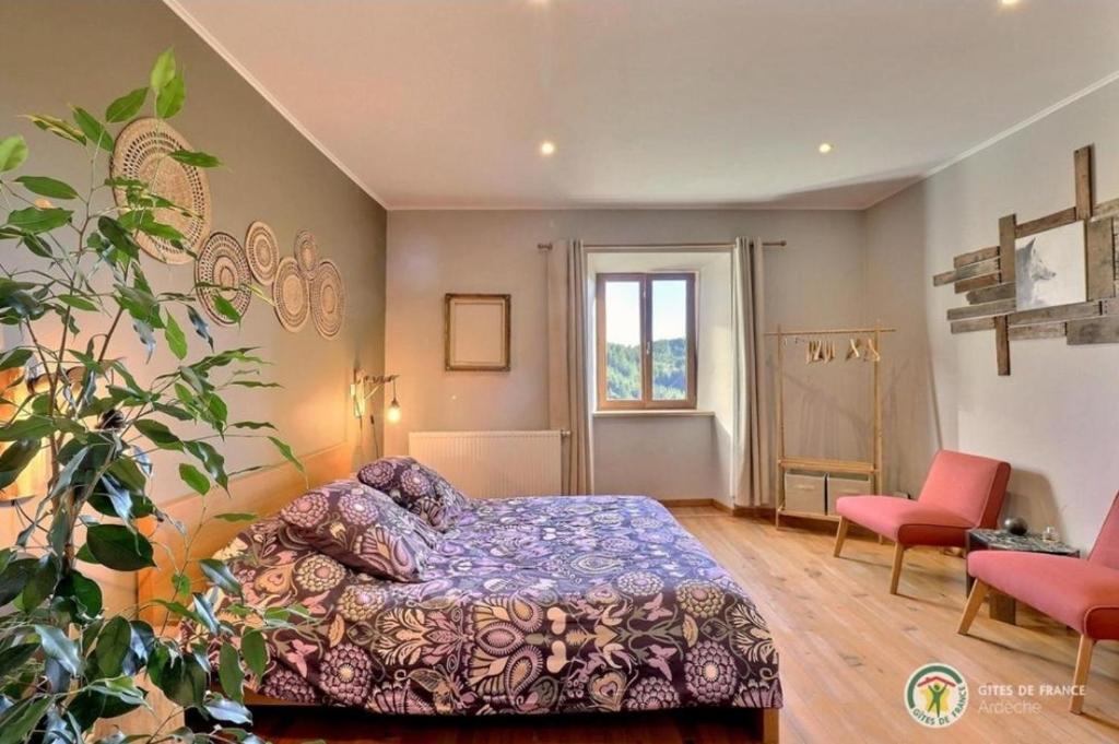 Postel nebo postele na pokoji v ubytování Grange De Sagne maison et table d hôtes avec dîner sur réservation