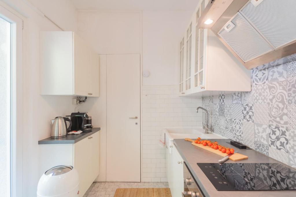 A kitchen or kitchenette at Top Lake View Villetta by Rent All Como