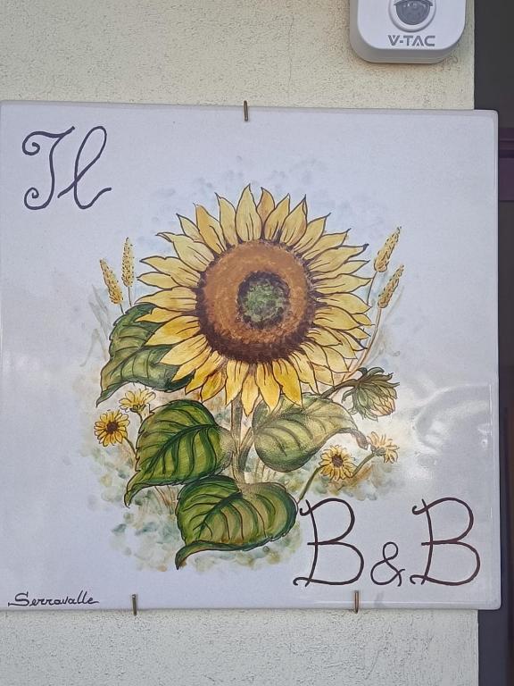a drawing of a sunflower on a piece of paper at Apartment Girasole in Acquedolci