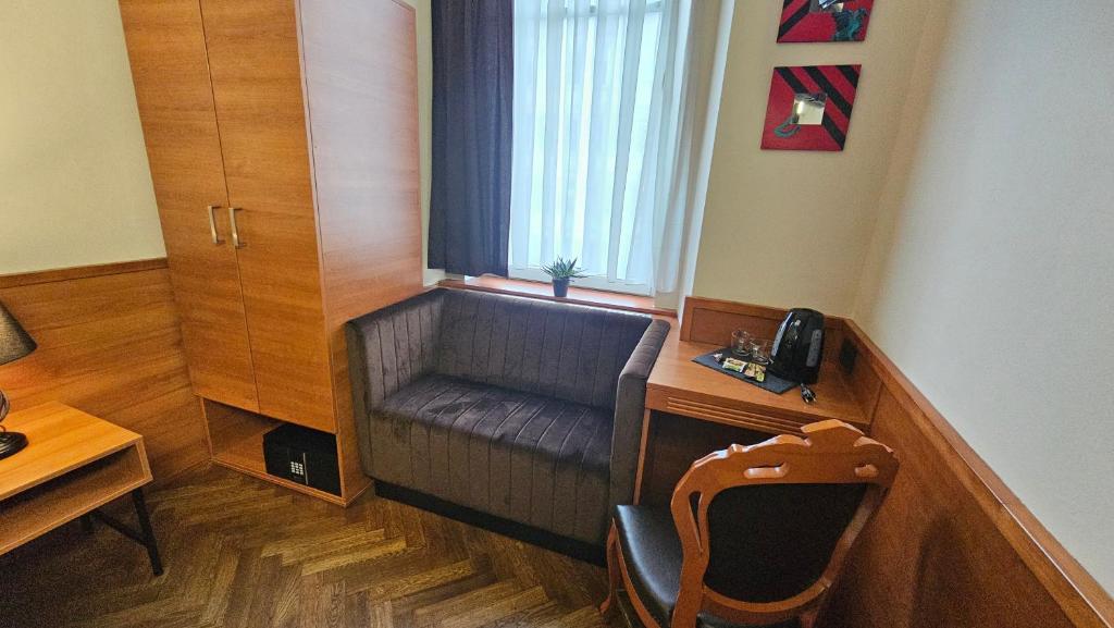 TV a/nebo společenská místnost v ubytování Center Ljubljana