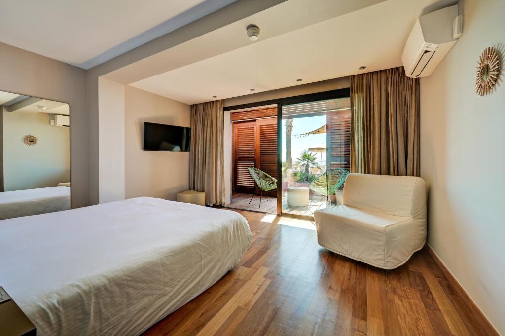 Postel nebo postele na pokoji v ubytování Hôtel Bor