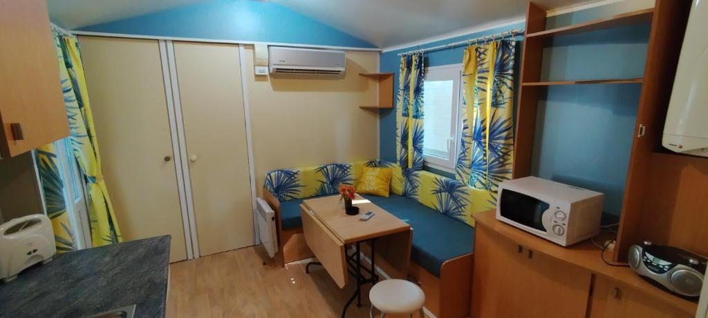 Kuchyň nebo kuchyňský kout v ubytování Mipro Mobilhome