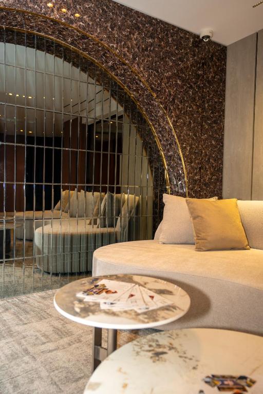 Predel za sedenje v nastanitvi Hotel Consul