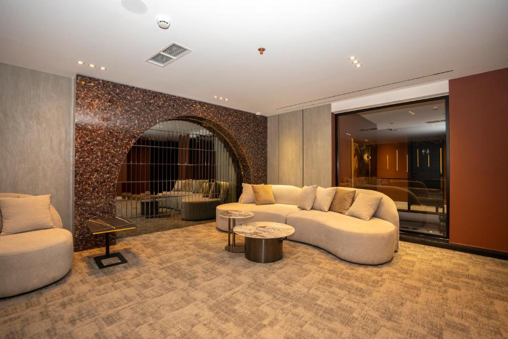 Predel za sedenje v nastanitvi Hotel Consul