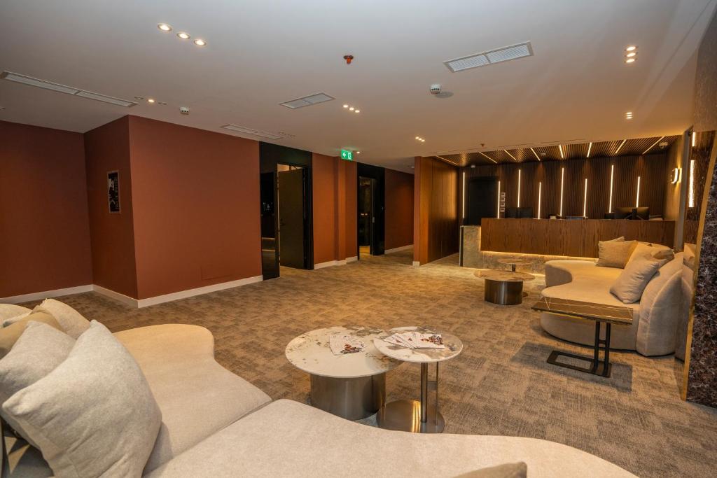 Predel za sedenje v nastanitvi Hotel Consul