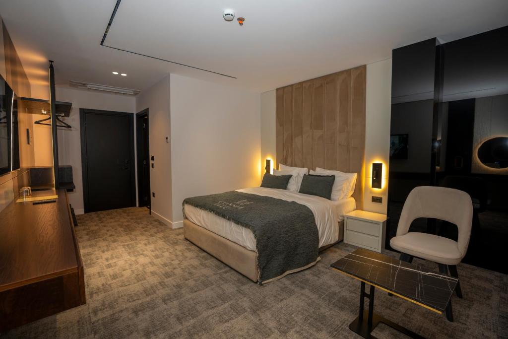 Postelja oz. postelje v sobi nastanitve Hotel Consul